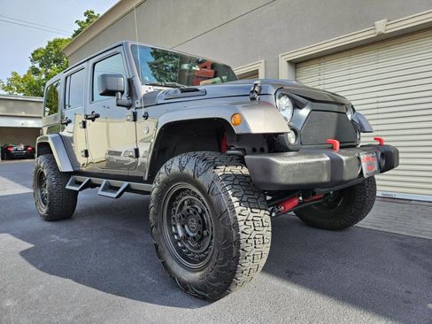 Used 2014 Jeep Wrangler Unlimited Sahara w/ Dual Top Group image 35