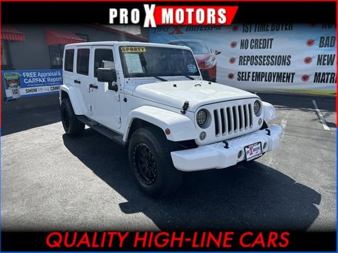 Used 2016 Jeep Wrangler Unlimited Sahara w/ Max Tow Package image 1