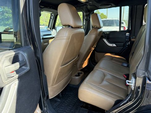 Used 2014 Jeep Wrangler Unlimited Rubicon w/ Dual Top Group AWD/4WD image 12