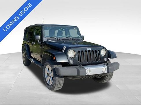 Used 2015 Jeep Wrangler Unlimited Sahara AWD/4WD image 1