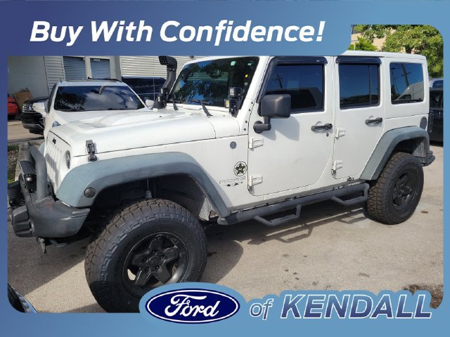Used 2013 Jeep Wrangler Unlimited Sahara AWD/4WD image 1