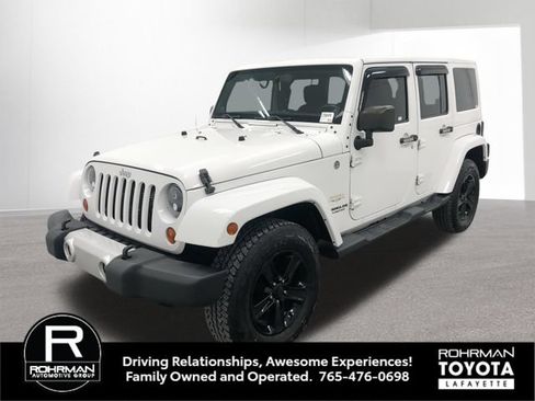 Used 2013 Jeep Wrangler Unlimited Sahara w/ Connectivity Group AWD/4WD image 1