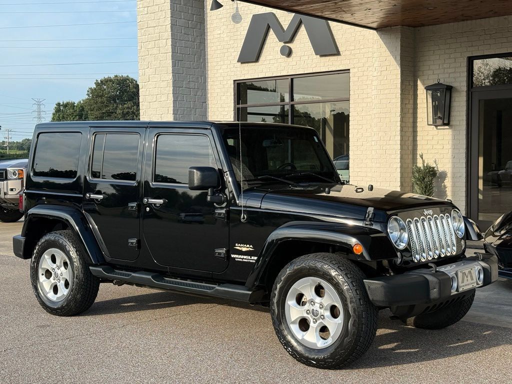 Used 2014 Jeep Wrangler Unlimited Sahara w/ Max Tow Package AWD/4WD image 1