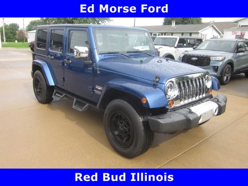 Used 2009 Jeep Wrangler Unlimited Sahara w/ Mopar Leather Group AWD/4WD image 1