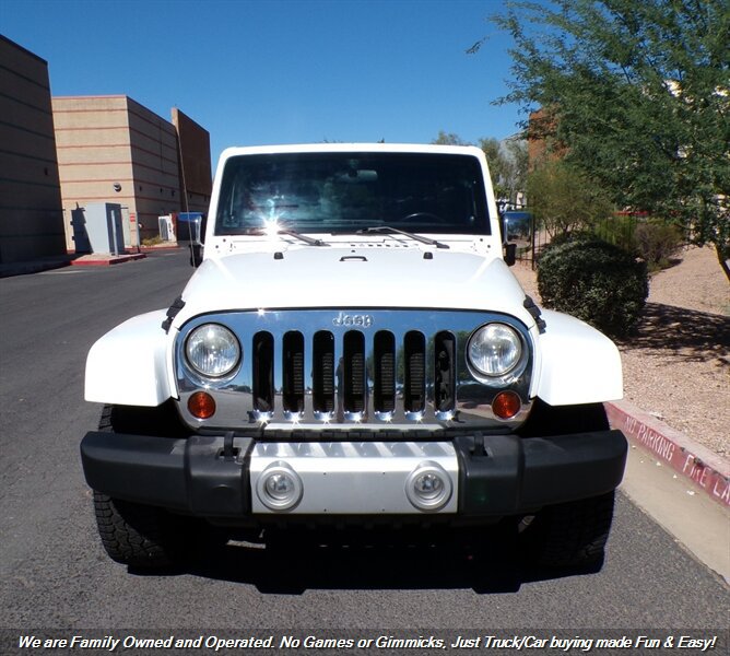 Used 2012 Jeep Wrangler Unlimited Sahara w/ Dual Top Group AWD/4WD image 2