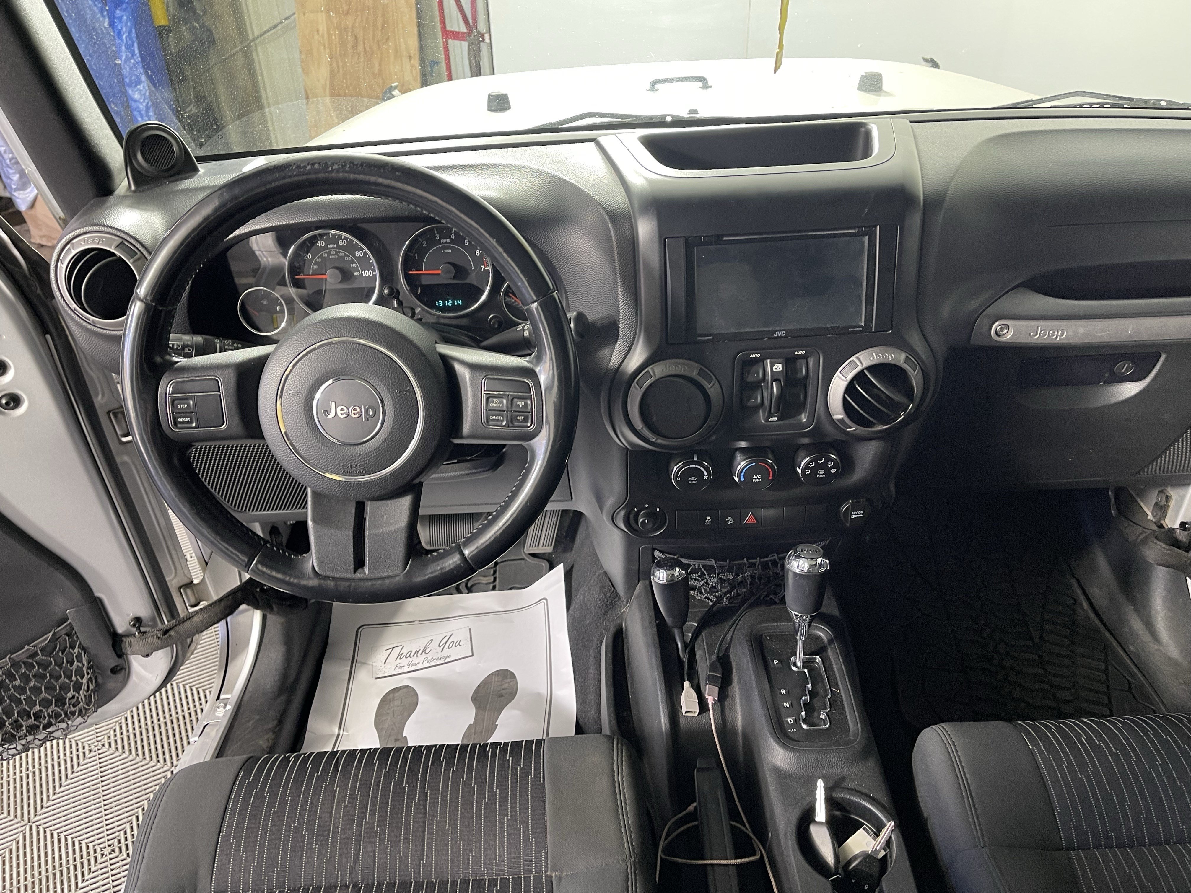 Used 2012 Jeep Wrangler Unlimited Sport AWD/4WD image 14