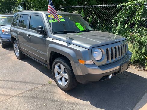 Used 2014 Jeep Patriot Latitude w/ Sun/Sound Group AWD/4WD image 1