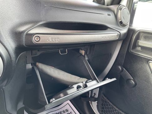 Used 2012 Jeep Wrangler Unlimited Sport w/ Black Appearance Group image 16