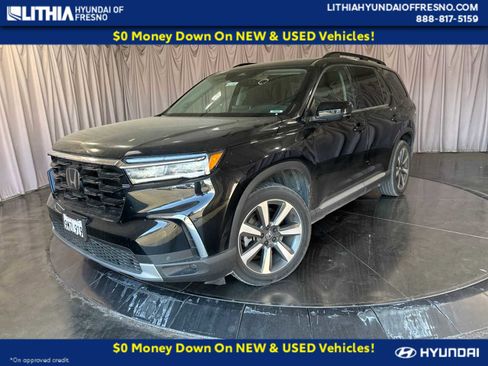 Used 2024 Honda Pilot Touring image 1