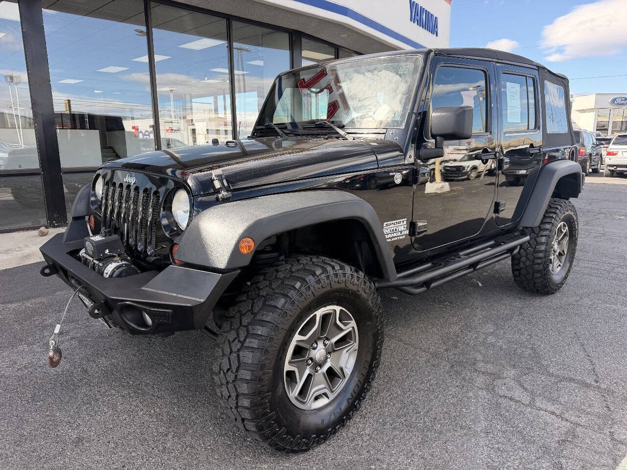 Used 2012 Jeep Wrangler Unlimited Sport w/ Trailer Tow Group AWD/4WD image 1