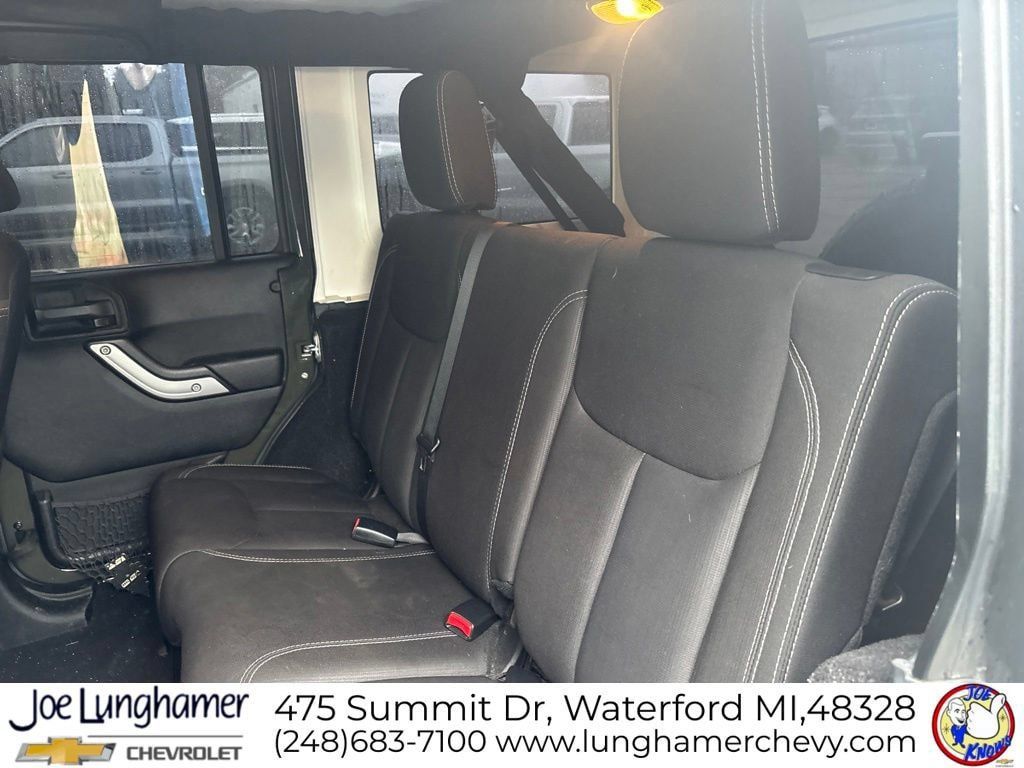 Used 2015 Jeep Wrangler Unlimited Sahara w/ Dual Top Group AWD/4WD image 13