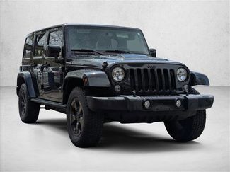 Used 2015 Jeep Wrangler Unlimited Sahara AWD/4WD video 3