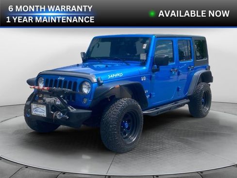 Used 2016 Jeep Wrangler Unlimited Sahara image 1