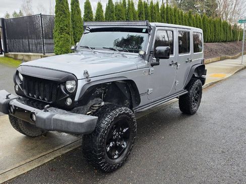 Used 2015 Jeep Wrangler Unlimited Sahara w/ Dual Top Group image 1