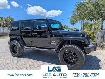 Used 2014 Jeep Wrangler Unlimited Sahara w/ Dual Top Group