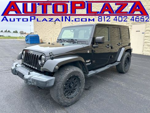 Used 2014 Jeep Wrangler Unlimited Sahara w/ Dual Top Group AWD/4WD image 1