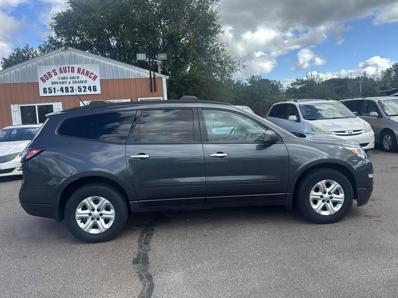 Used 2013 Chevrolet Traverse LS w/ LPO, 'HIT The Road' Package AWD/4WD image 4