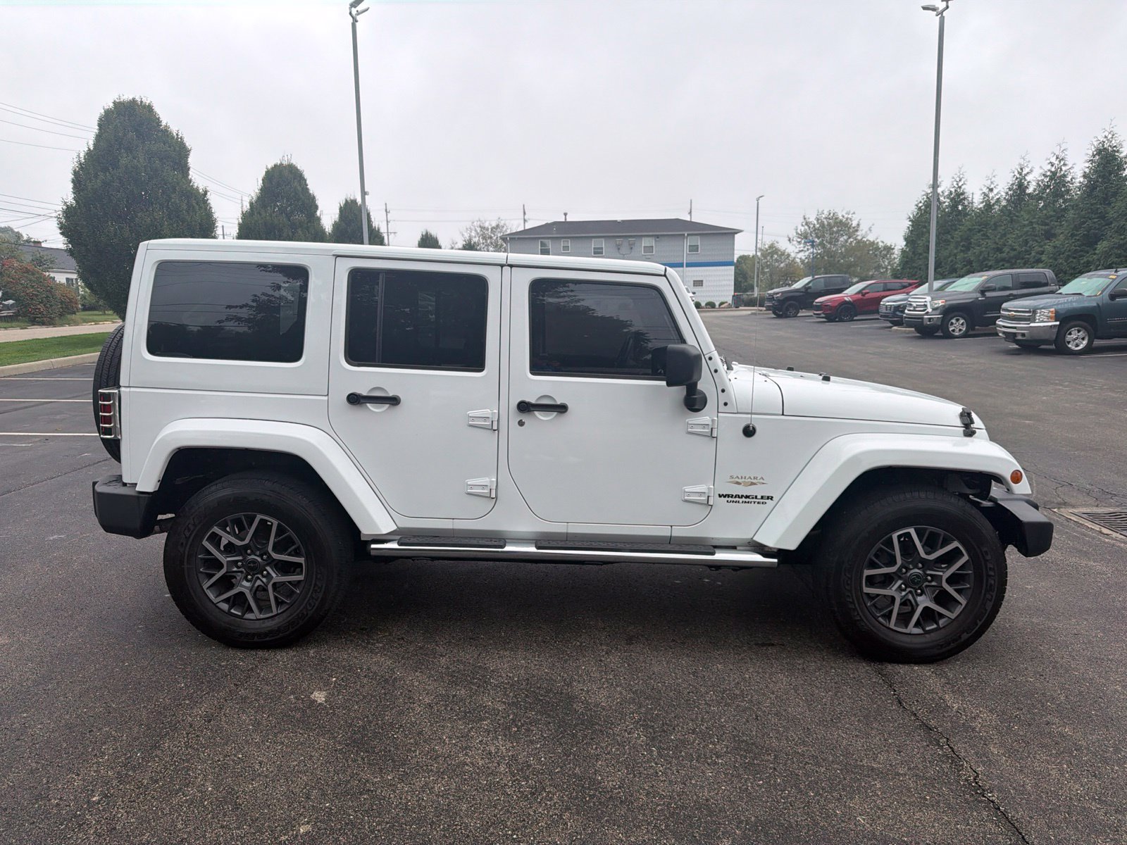 Used 2013 Jeep Wrangler Unlimited Sahara w/ Mopar Chrome Edition Group AWD/4WD image 6