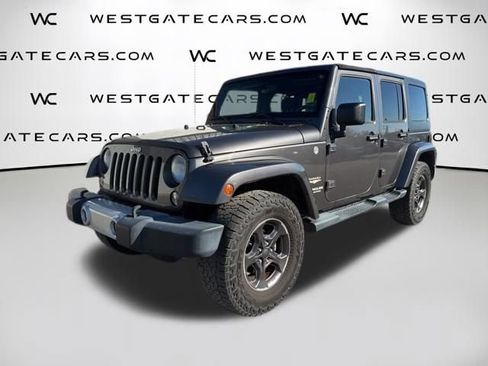 Used 2014 Jeep Wrangler Unlimited Sahara w/ Max Tow Package image 1