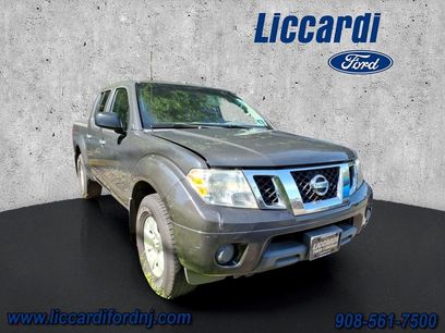 Used 2012 Nissan Frontier SV w/ SV Premium Utility Pkg