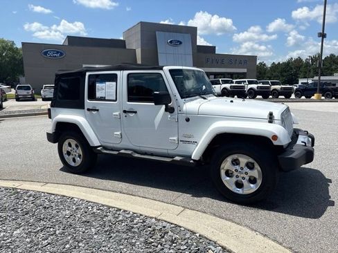 Used 2014 Jeep Wrangler Unlimited Sahara w/ Connectivity Group AWD/4WD image 1