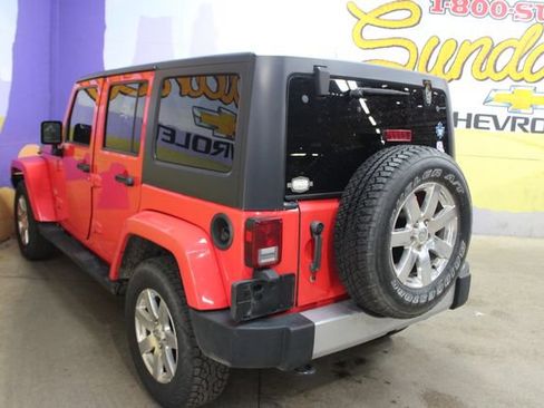 Used 2013 Jeep Wrangler Unlimited Sahara w/ Dual Top Group AWD/4WD image 6