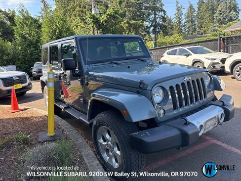 Used 2014 Jeep Wrangler Unlimited Sahara w/ Max Tow Package AWD/4WD image 1