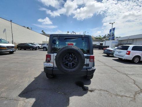 Used 2017 Jeep Wrangler Unlimited Sport w/ Mopar Black Appearance Group AWD/4WD image 7