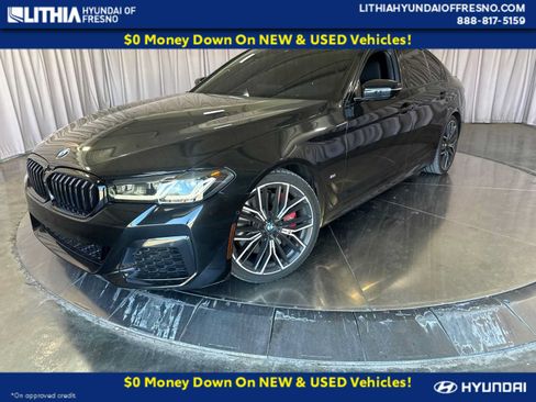 Used 2023 BMW M550i xDrive w/ Executive Package AWD/4WD image 1