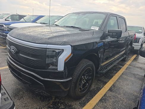 Used 2025 Ford F150 Lightning XLT AWD/4WD image 1