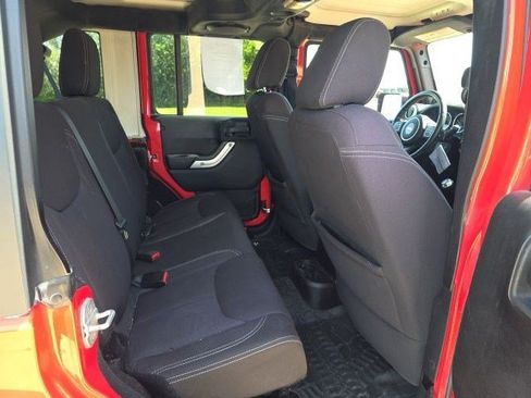 Used 2013 Jeep Wrangler Unlimited Rubicon w/ Dual Top Group AWD/4WD image 11