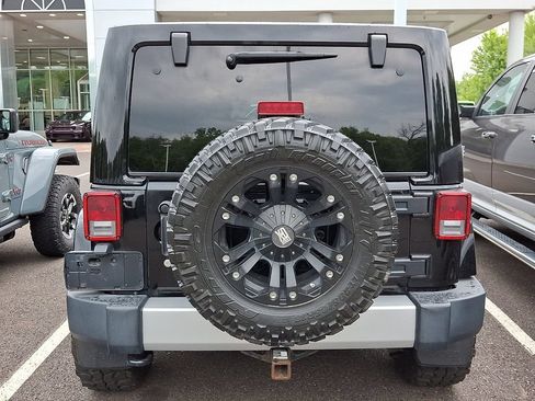 Used 2012 Jeep Wrangler Unlimited Sahara w/ Dual Top Group AWD/4WD image 6