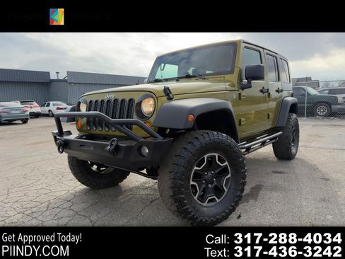 Used 2008 Jeep Wrangler Unlimited Rubicon w/ Dual Top Group image 1