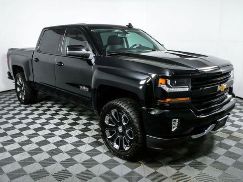 Used 2018 Chevrolet Silverado 1500 LT w/ Texas Edition AWD/4WD image 1