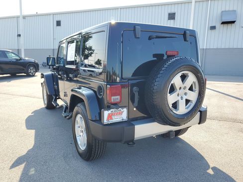 Used 2012 Jeep Wrangler Unlimited Sahara w/ Dual Top Group AWD/4WD image 3