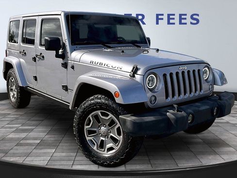 Used 2014 Jeep Wrangler Unlimited Rubicon w/ Dual Top Group AWD/4WD image 3