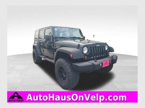 Used 2010 Jeep Wrangler Unlimited Sport AWD/4WD image 1