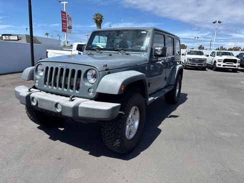 Used 2014 Jeep Wrangler Unlimited Sport w/ Quick Order Package 24S AWD/4WD image 1
