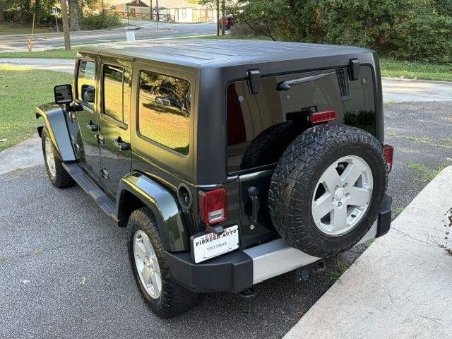 Used 2011 Jeep Wrangler Unlimited Sahara w/ Connectivity Group AWD/4WD image 9