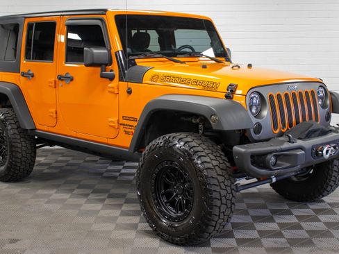 Used 2013 Jeep Wrangler Unlimited Sport AWD/4WD image 1