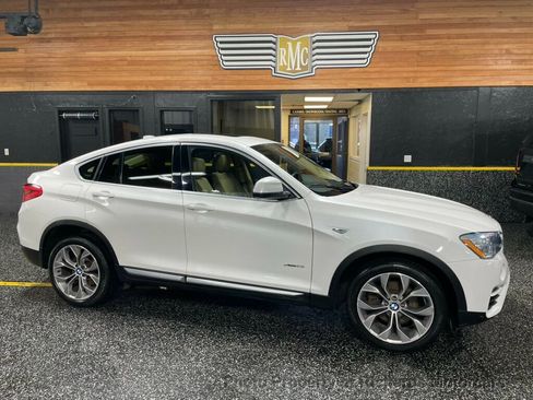 Used 2016 BMW X4 xDrive28i AWD/4WD image 1