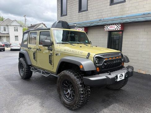 Used 2013 Jeep Wrangler Unlimited Sport w/ Mopar Black Appearance Group AWD/4WD image 7