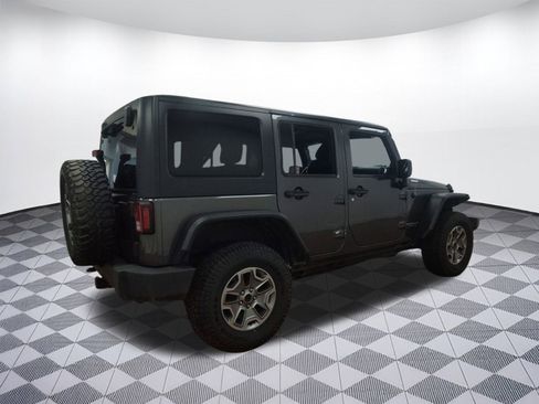 Used 2014 Jeep Wrangler Unlimited Rubicon w/ Dual Top Group image 8