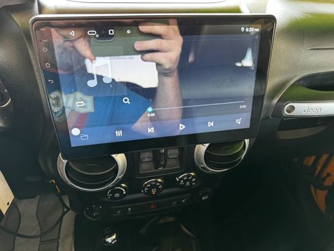 Used 2012 Jeep Wrangler Unlimited Rubicon w/ Dual Top Group image 16