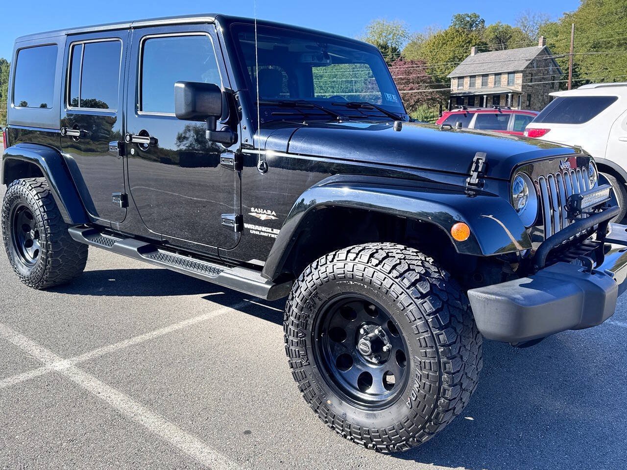 Used 2016 Jeep Wrangler Unlimited Sahara w/ Dual Top Group AWD/4WD image 1