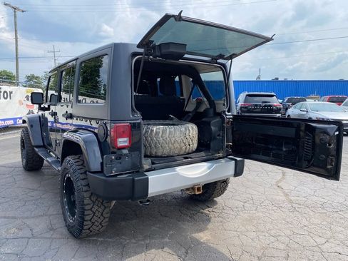 Used 2013 Jeep Wrangler Unlimited Sahara w/ Dual Top Group AWD/4WD image 5