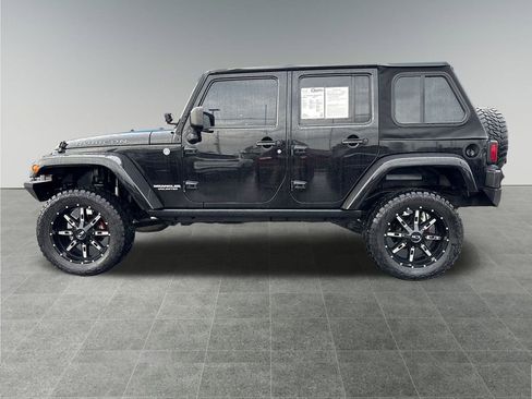 Used 2013 Jeep Wrangler Unlimited Rubicon w/ Dual Top Group image 2