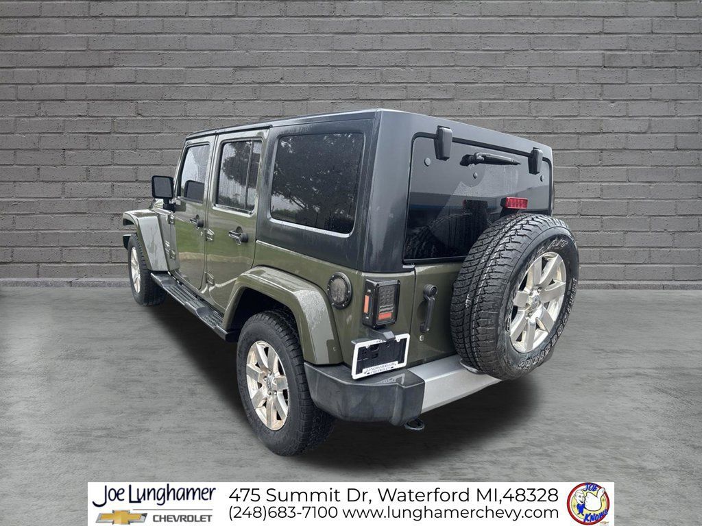 Used 2015 Jeep Wrangler Unlimited Sahara w/ Dual Top Group AWD/4WD image 6
