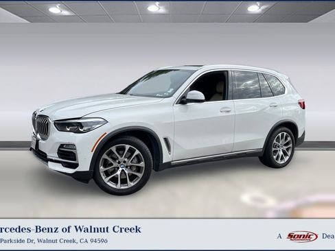 Used 2021 BMW X5 xDrive40i w/ Premium Package 3 AWD/4WD image 1