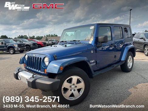 Used 2009 Jeep Wrangler Unlimited Sahara w/ Mopar Leather Group AWD/4WD image 1